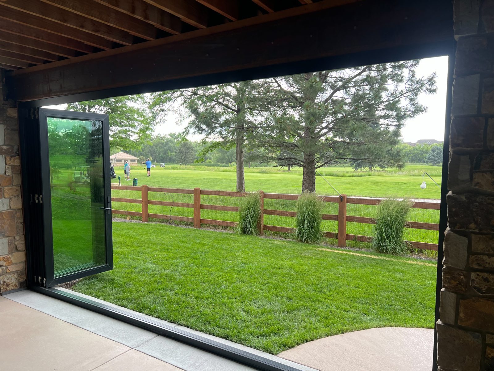 Black Win-Dor folding patio door fully open, seen from inside