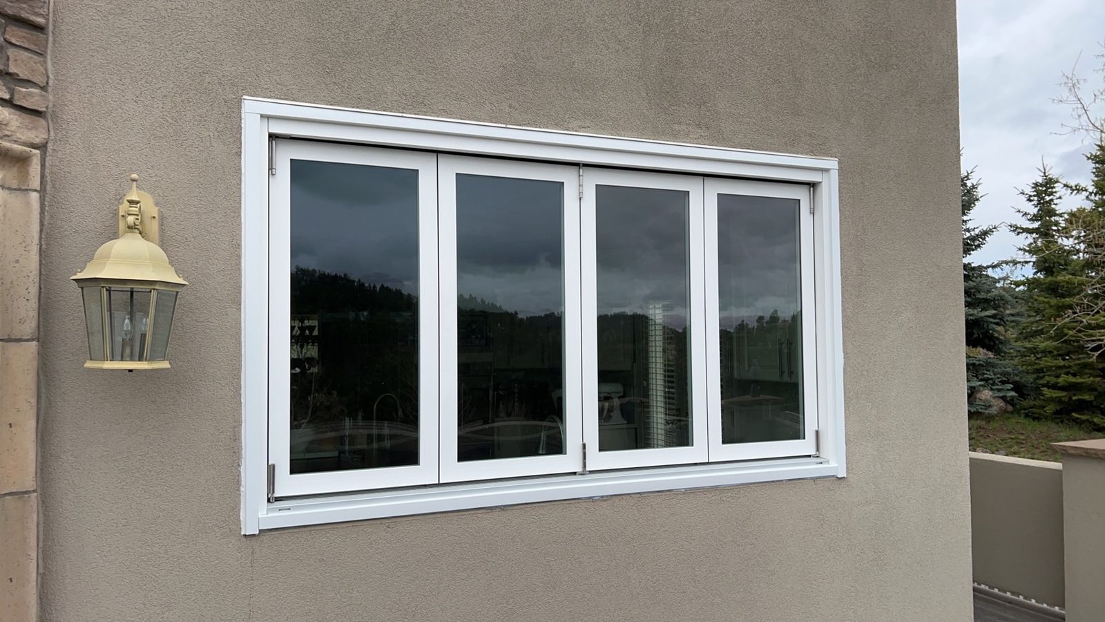 White Win-Dor bifold window closed, seen from outside